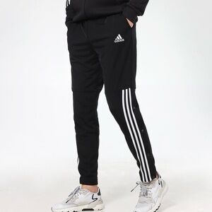 adidas running mens black Sports Essentials Knitted Tricot Snap Pants